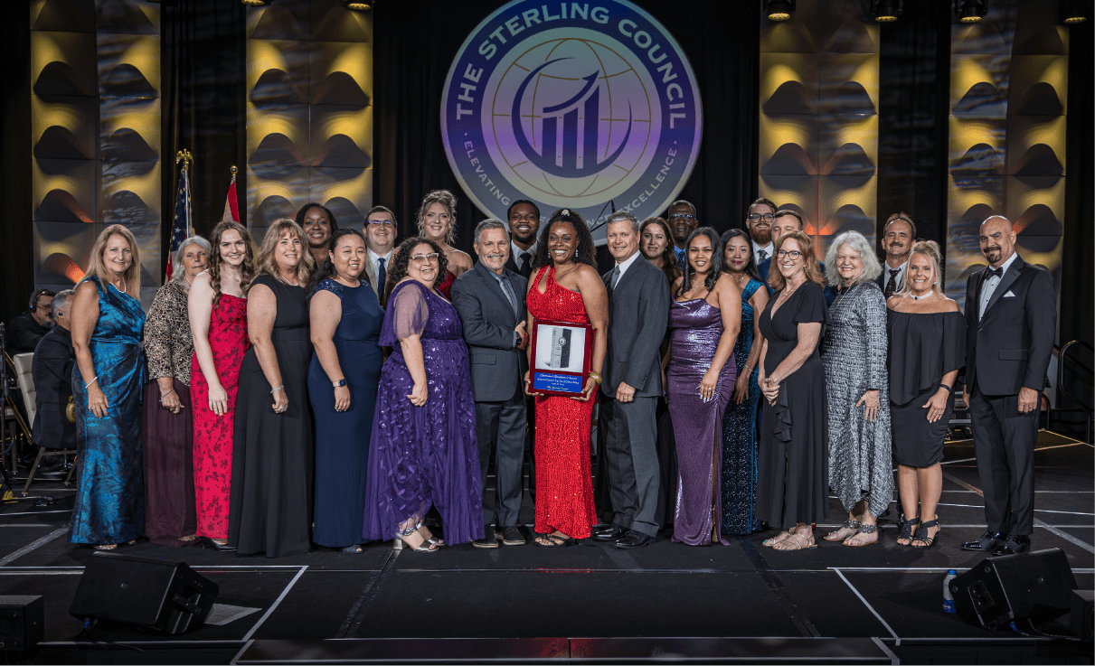 The Alachua County Tax Collector's Office accepting the 2026 Sterling Sustained Excellence Award